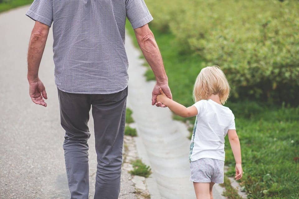 dad and daughter walk